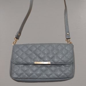 Damsel in defense purse